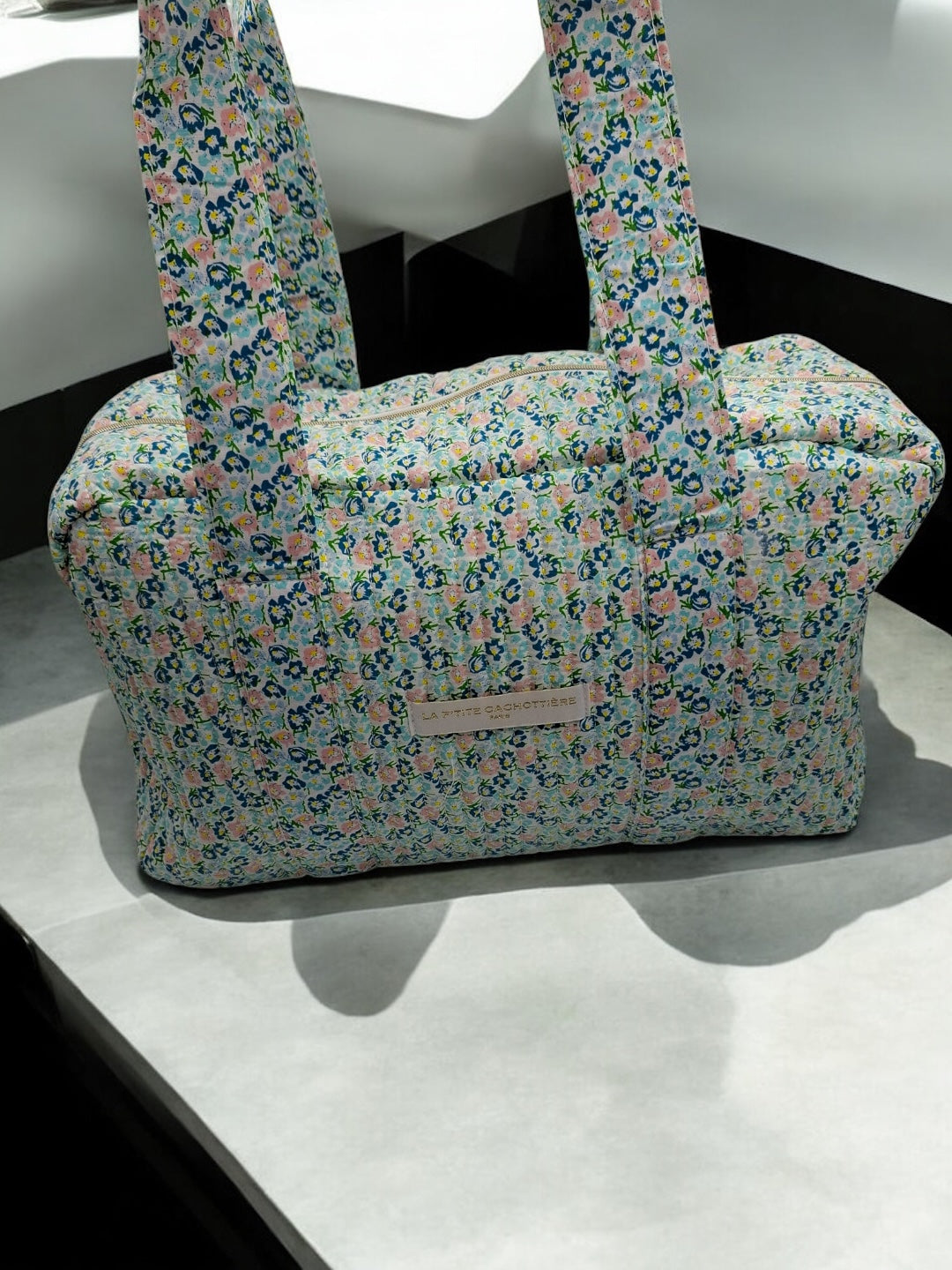 Sac week-end polochon en coton matelassé liberty fleuri bleu turquoise et touches orange