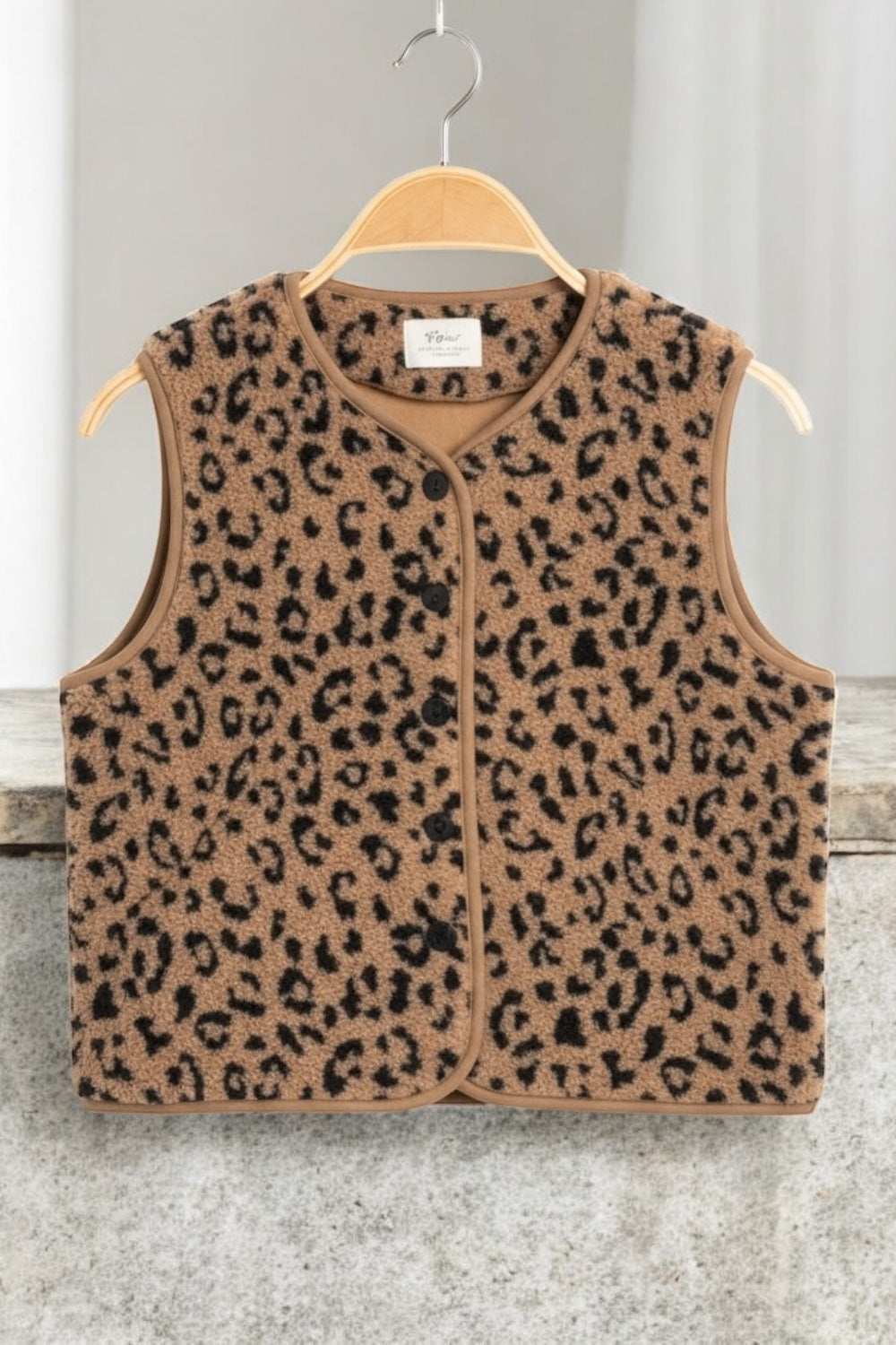 Veste gilet peluche moumoute sans manches imprimé léopard marron noir