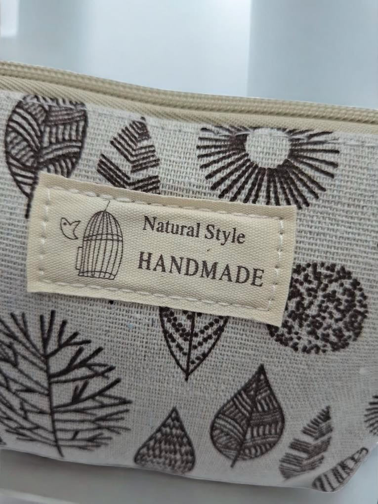 Trousse en coton blanche motifs de feuilles et de cercles en marron