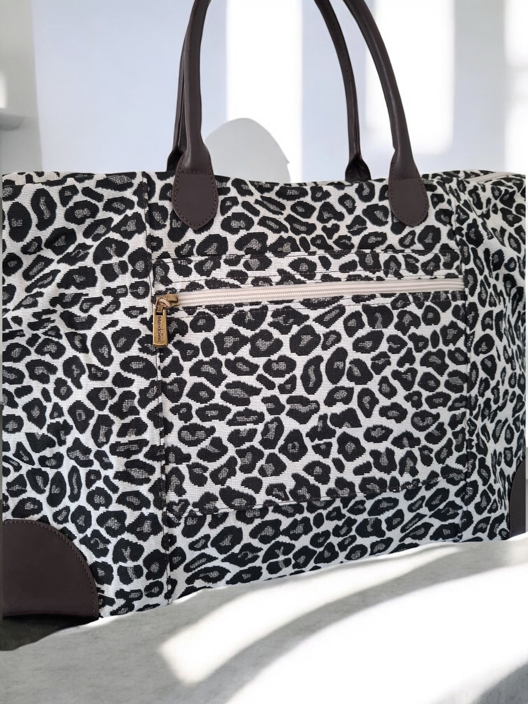 Grand sac porté épaule imprimé léopard blanc noir