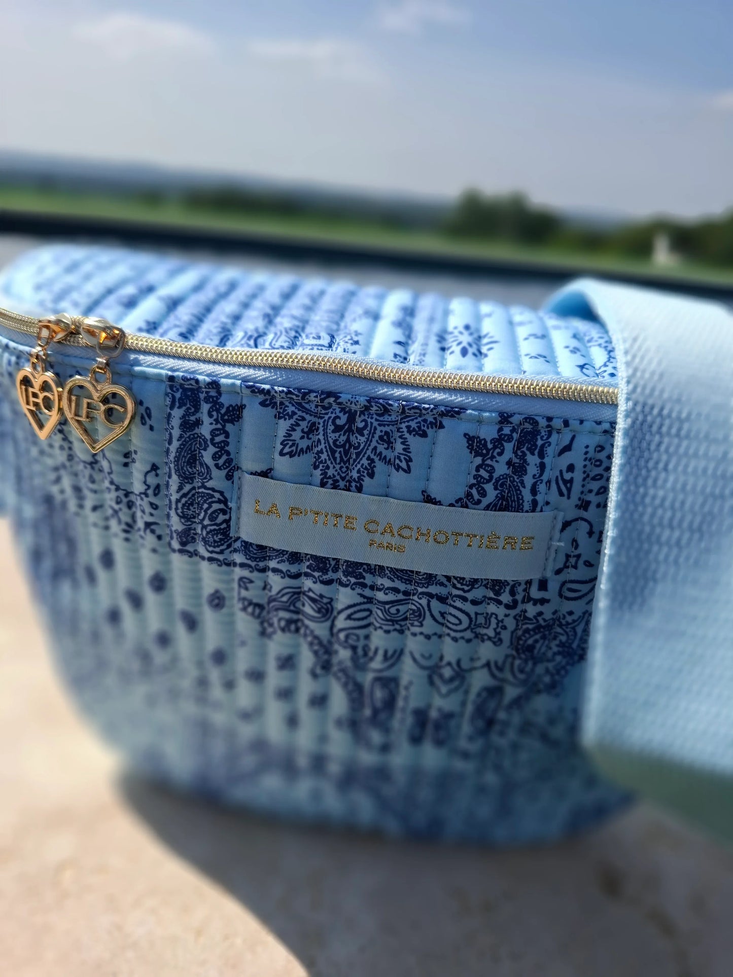 Riñonera de algodón acolchado azul con diseño paisley azul marino «La Ptite cachottière»