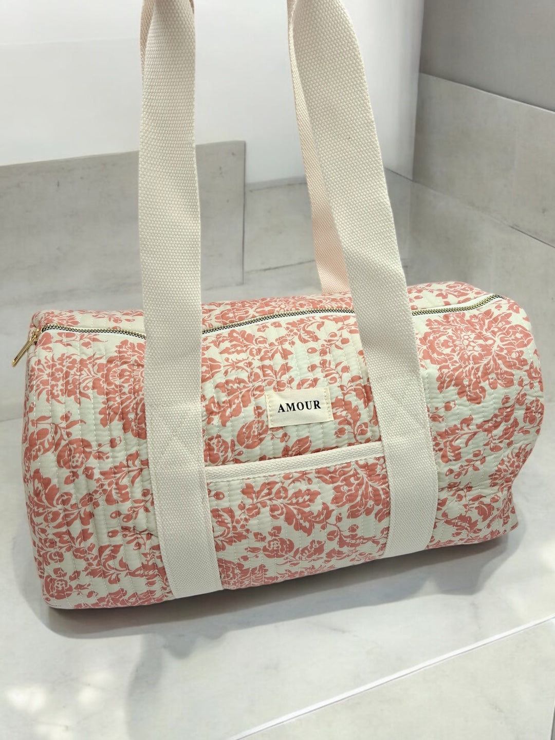 Sac polochon blanc en coton liberty fleuri corail