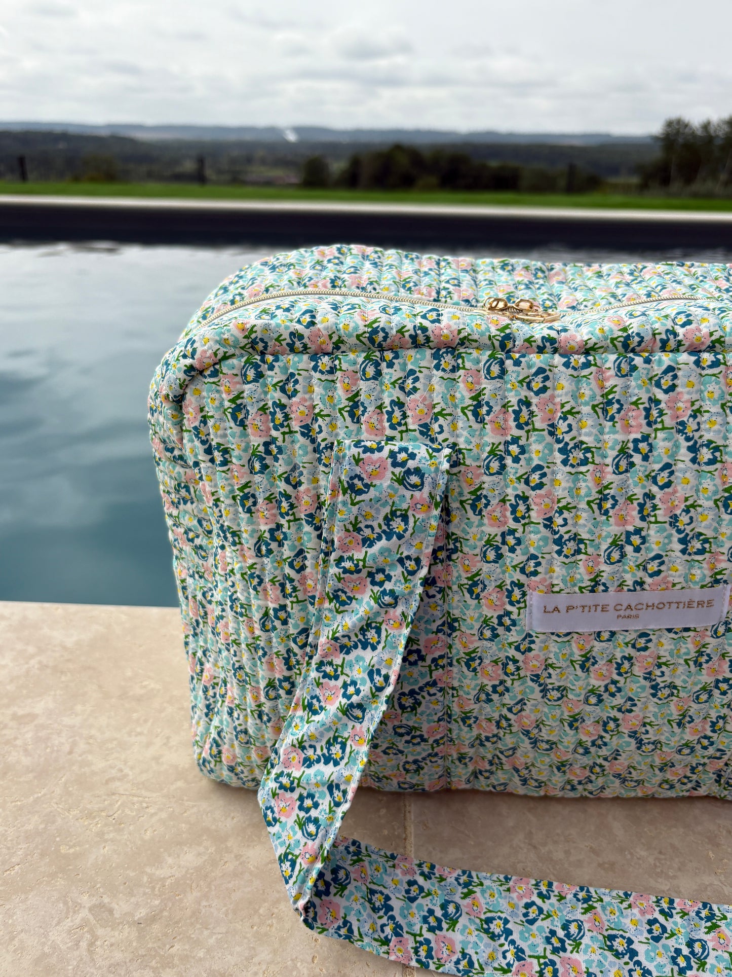 Sac week-end polochon en coton matelassé liberty fleuri bleu turquoise et touches orange