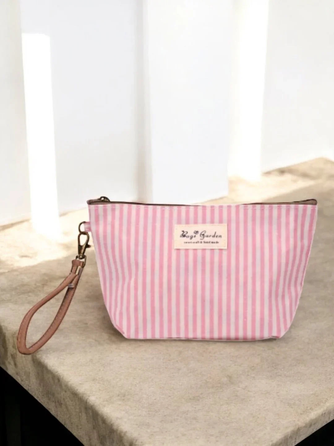 Pochette trousse en tissu imperméabilisé rose et blanc