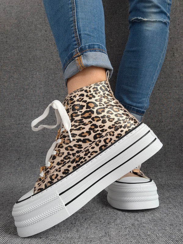 Chaussures baskets hautes semelle compensée en simili motif léopard style converse