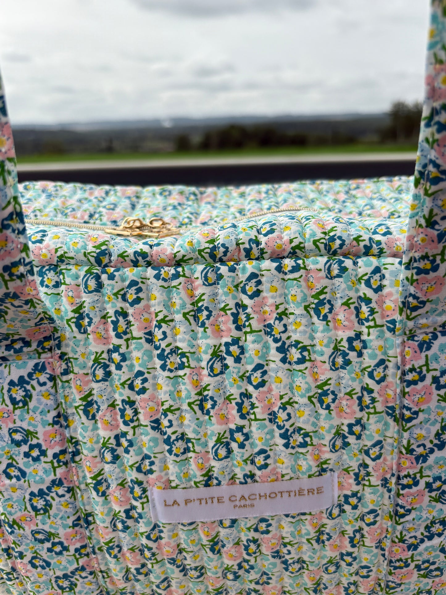 Sac week-end polochon en coton matelassé liberty fleuri bleu turquoise et touches orange