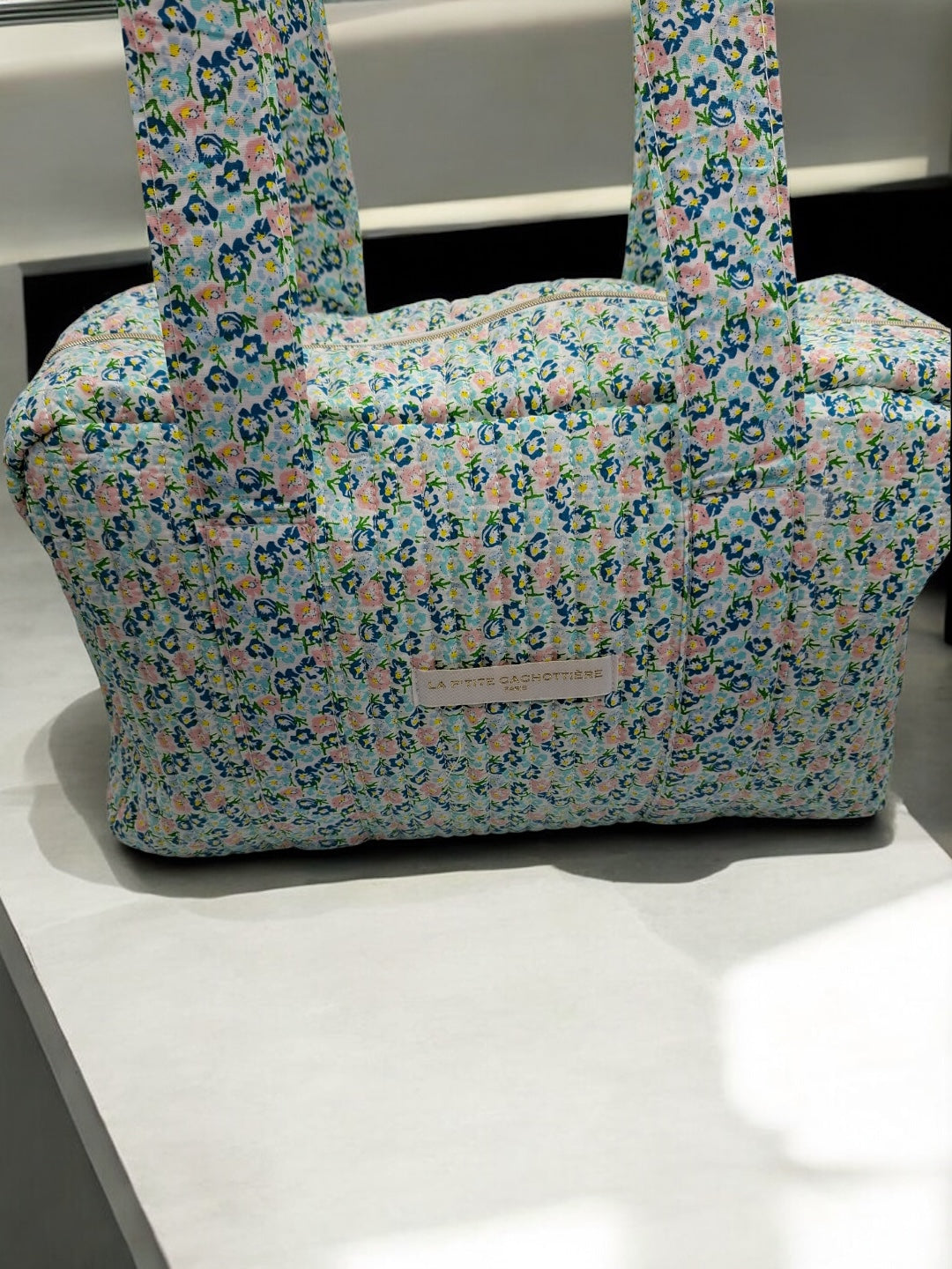 Sac week-end polochon en coton matelassé liberty fleuri bleu turquoise et touches orange