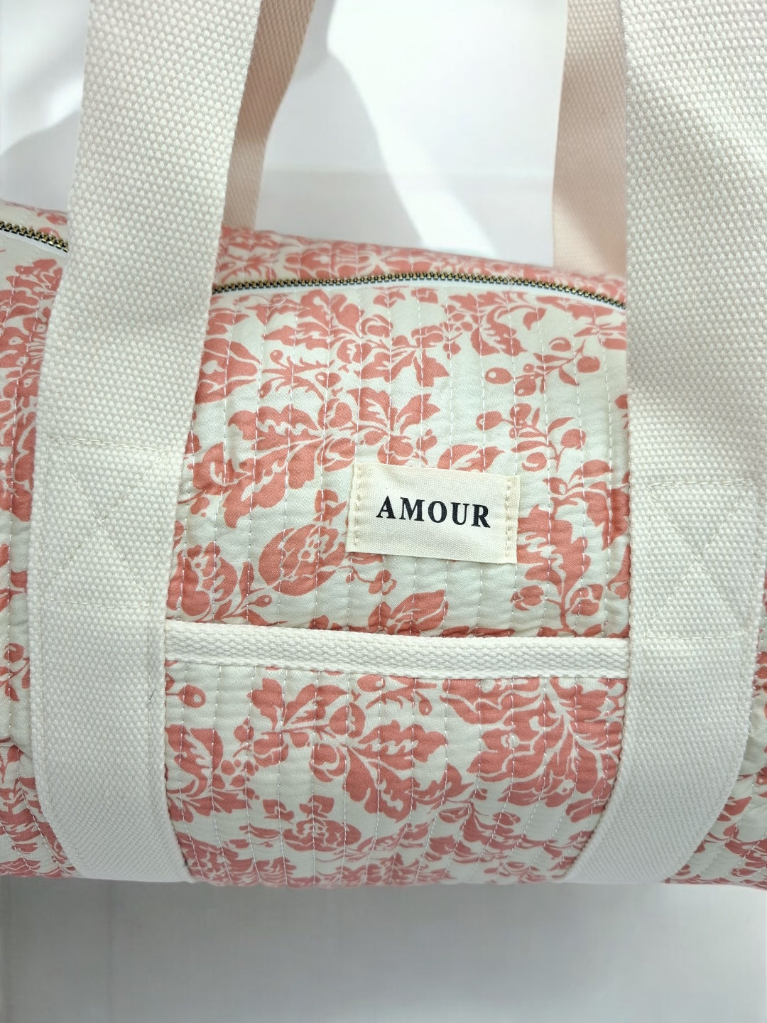 Sac polochon blanc en coton liberty fleuri corail