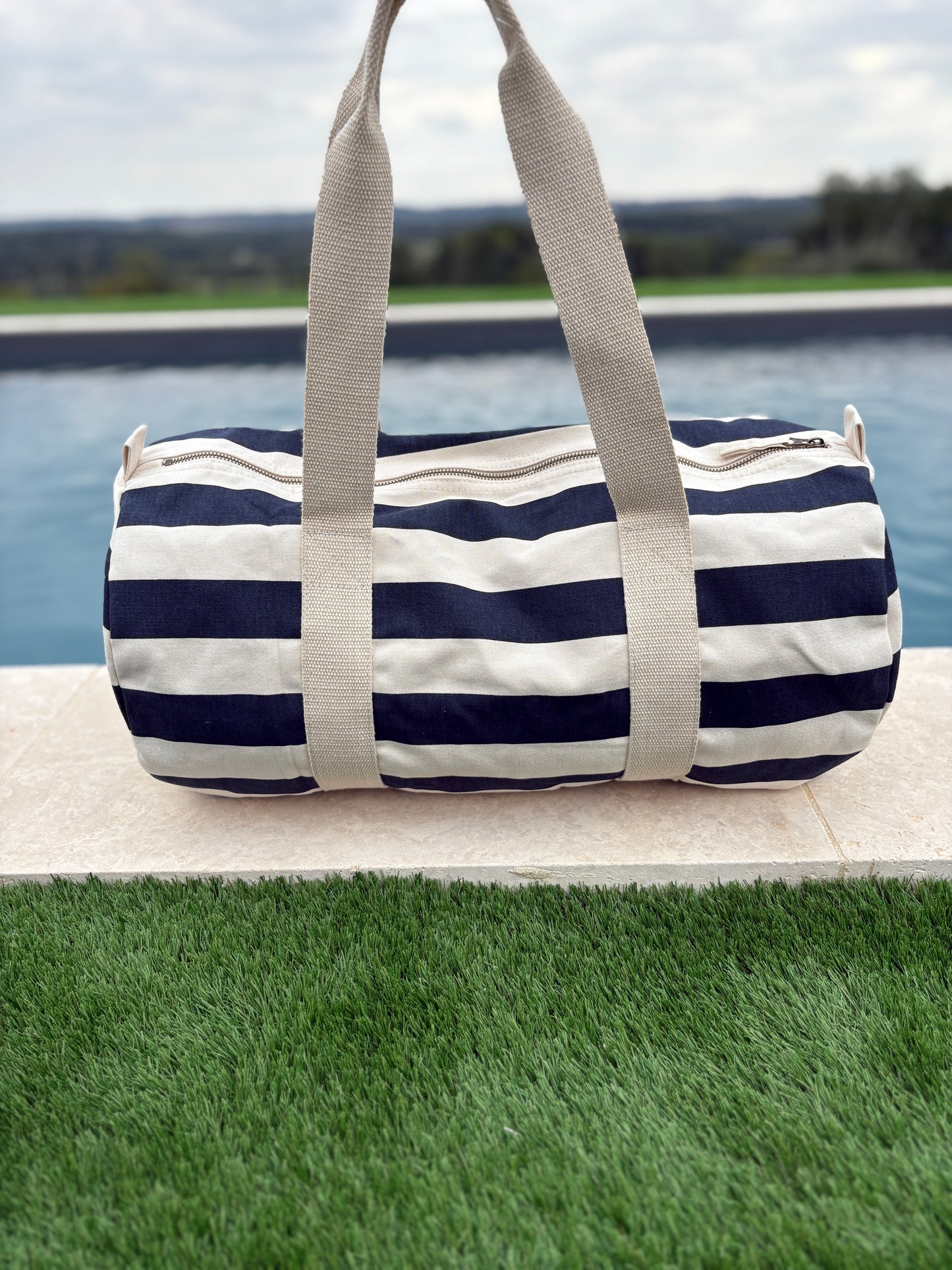 Sac polochon en coton rayé bleu marine et blanc