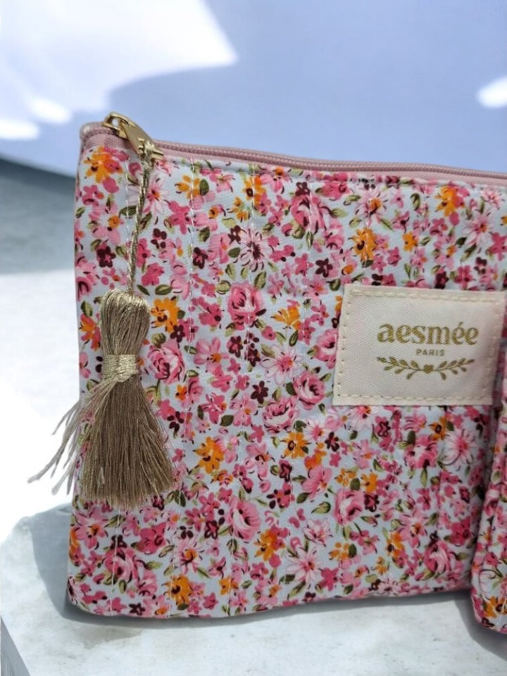 Trousse et pochette en coton motif floral avec des nuances de rose, jaune et blanc