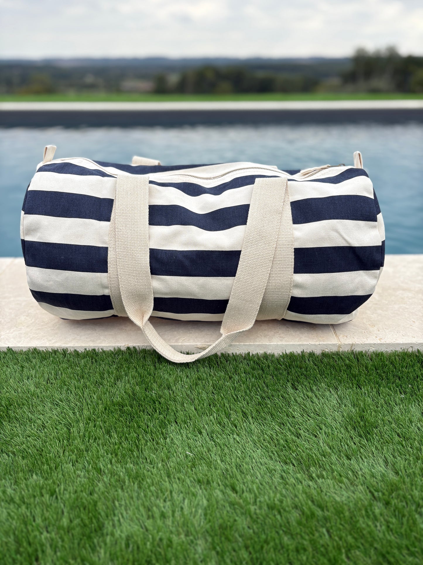 Sac polochon en coton rayé bleu marine et blanc