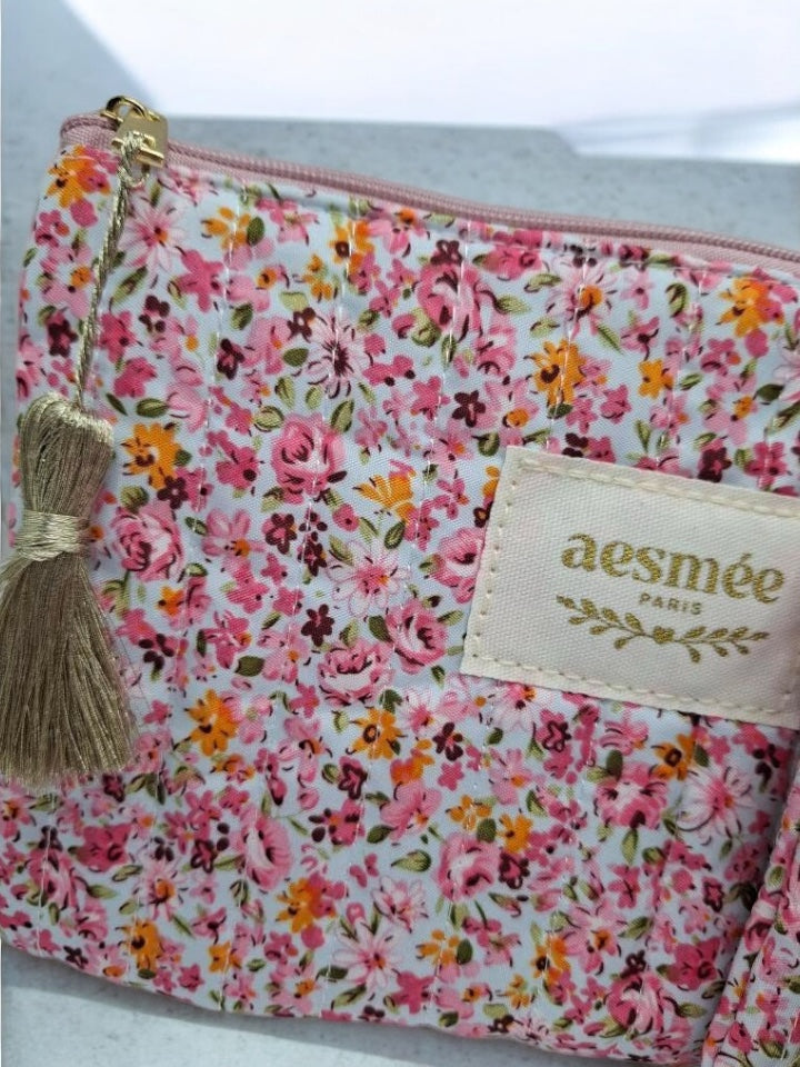 Trousse et pochette en coton motif floral avec des nuances de rose, jaune et blanc