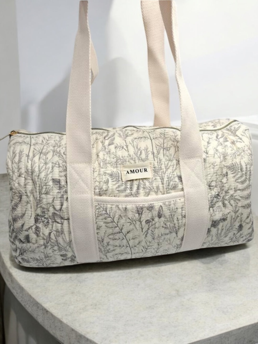 Sac polochon blanc en coton liberty fleuri noir