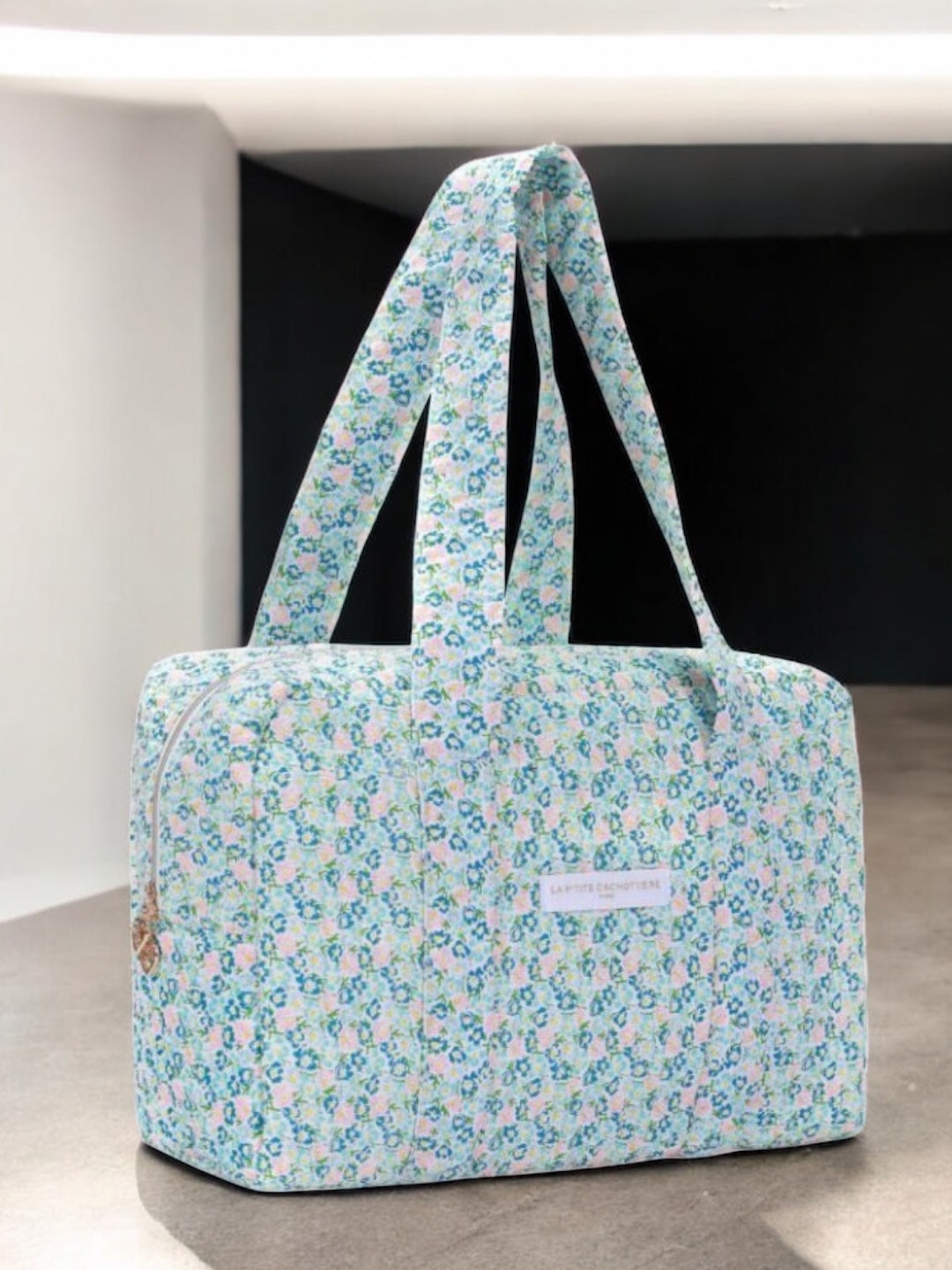 Sac week-end polochon en coton matelassé liberty fleuri bleu turquoise et touches orange