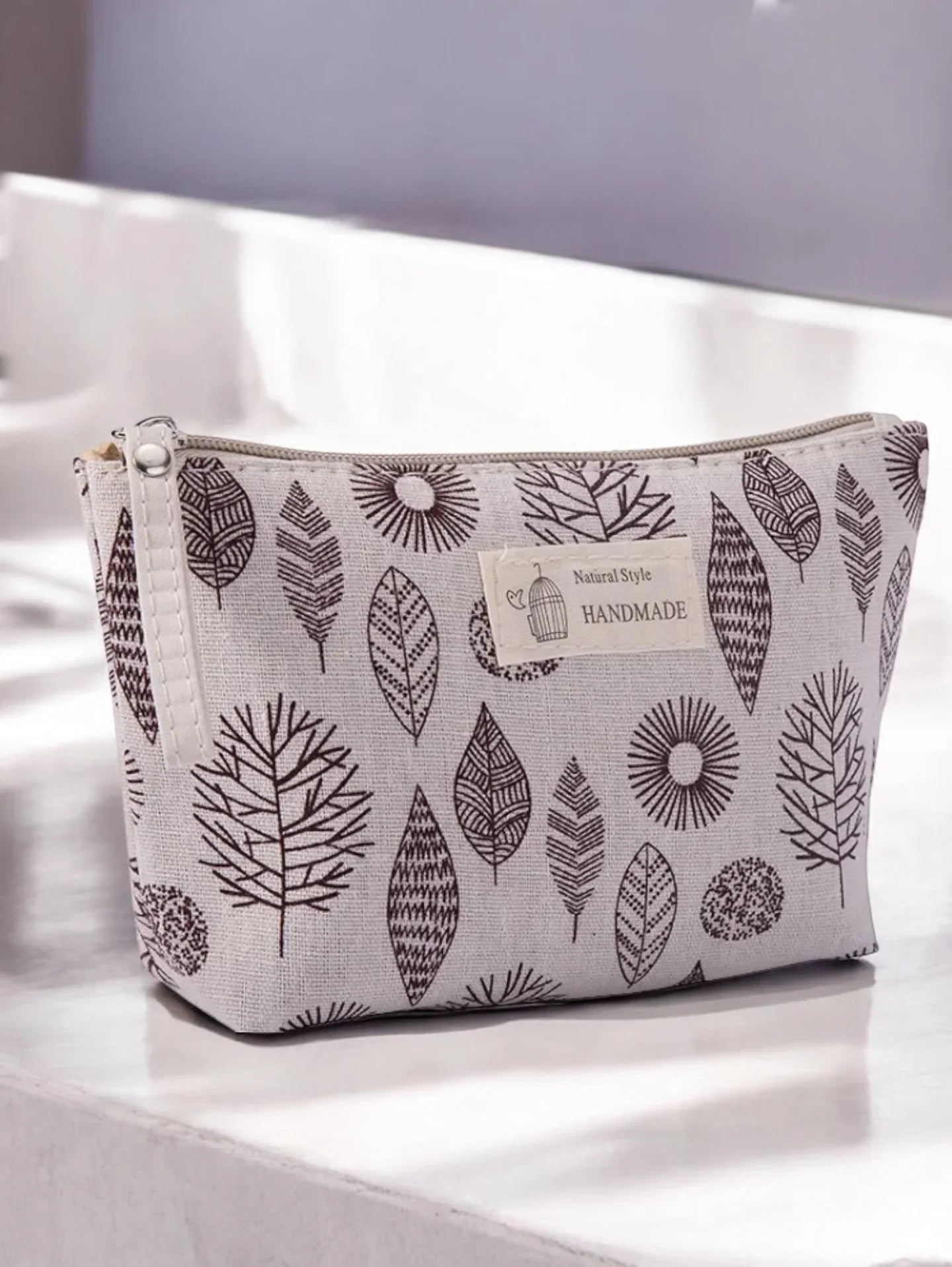 Trousse en coton blanche motifs de feuilles et de cercles en marron