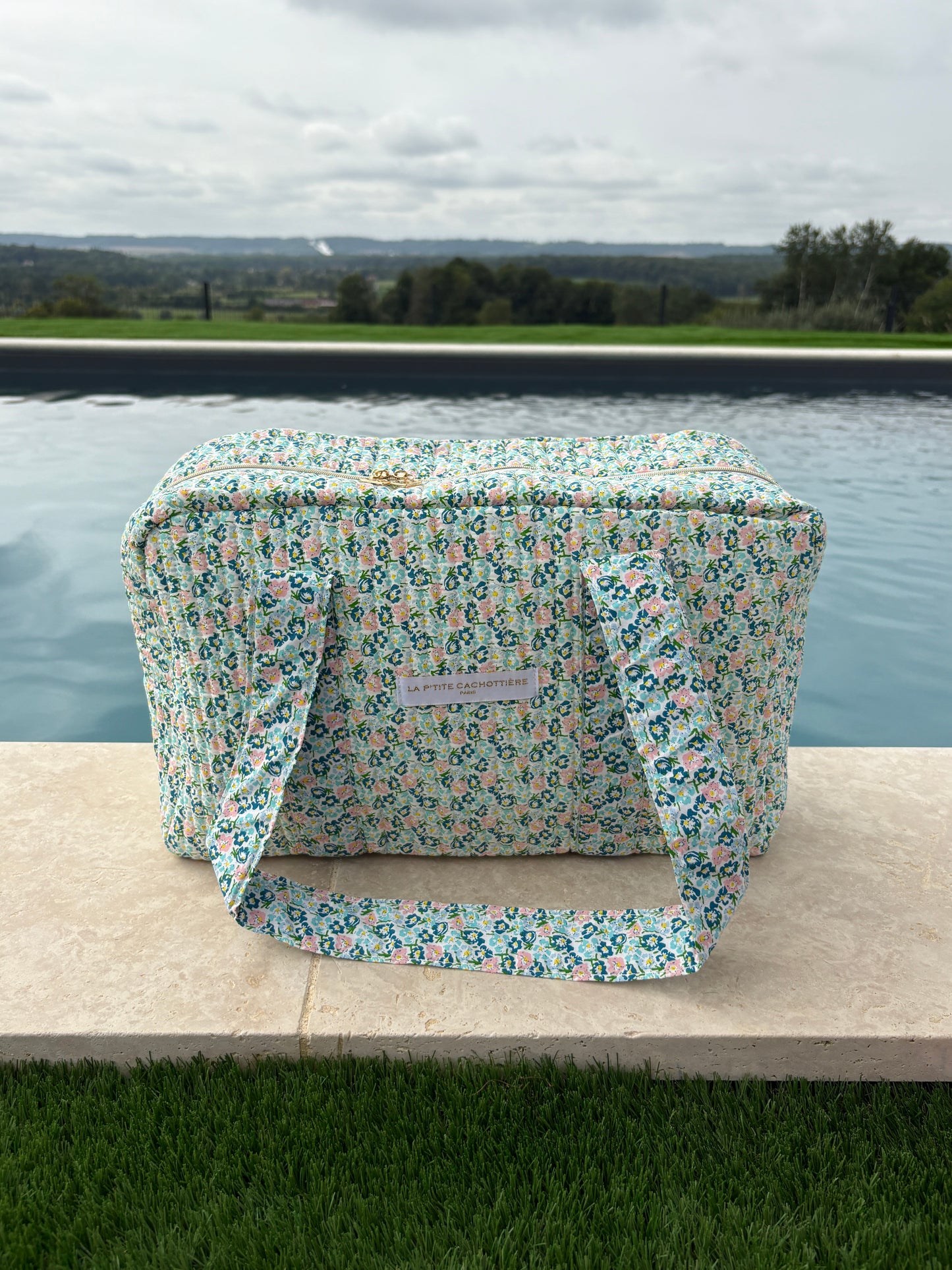 Sac week-end polochon en coton matelassé liberty fleuri bleu turquoise et touches orange