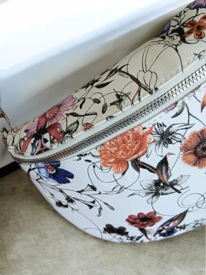 Le Petit Placard floral print belt bag, white background with colorful flower pattern