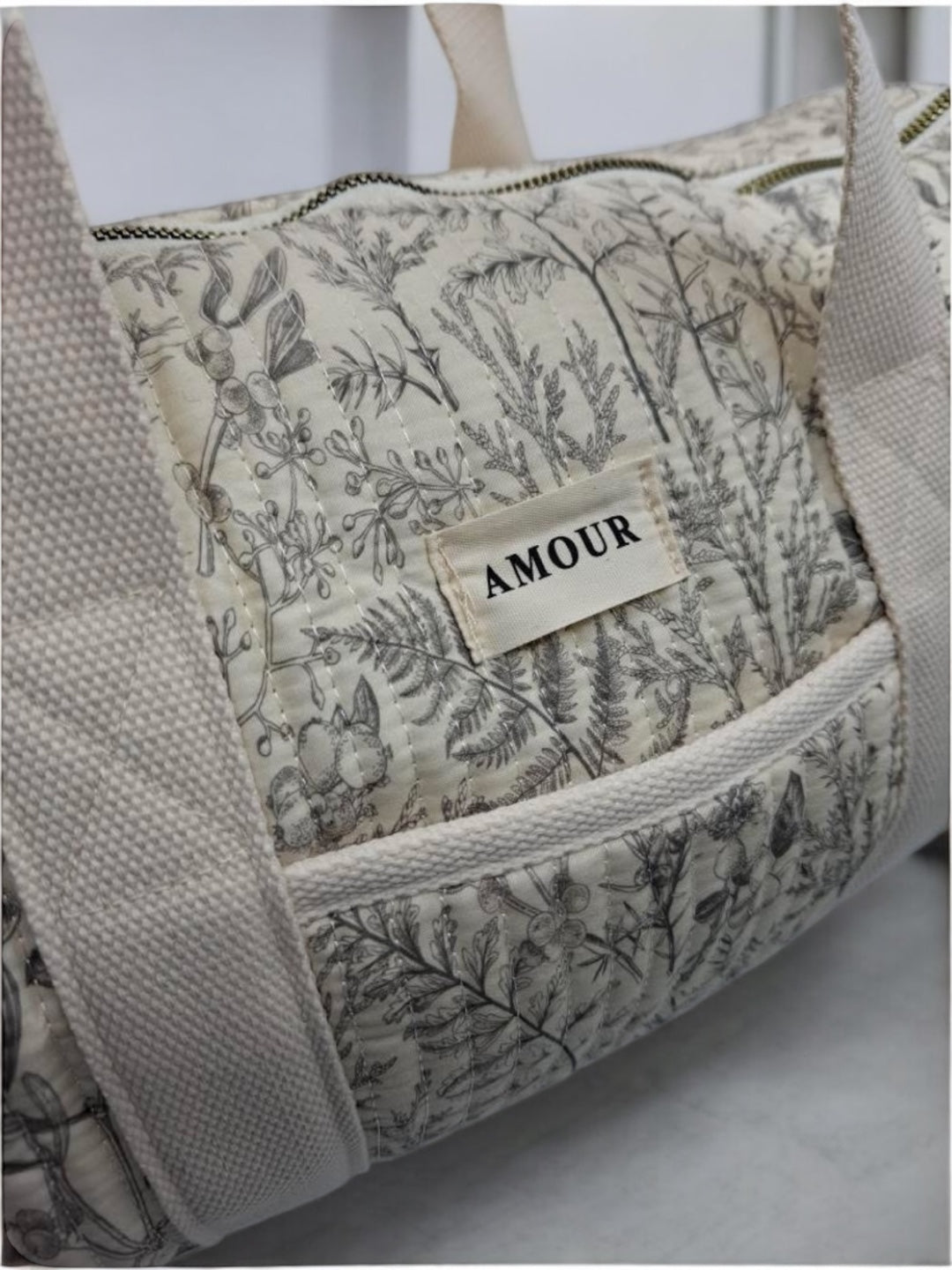 Sac polochon blanc en coton liberty fleuri noir