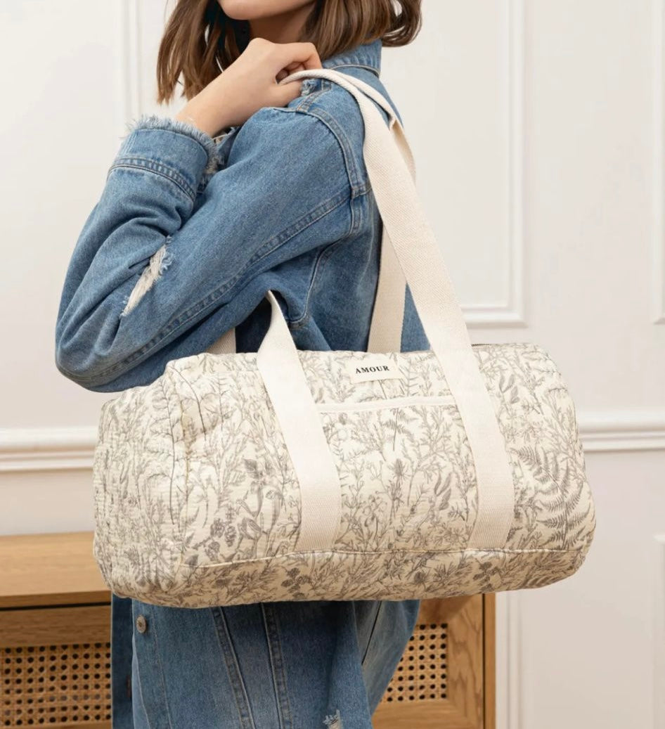 Nouveautés - Sac polochon blanc en coton liberty fleuri noir