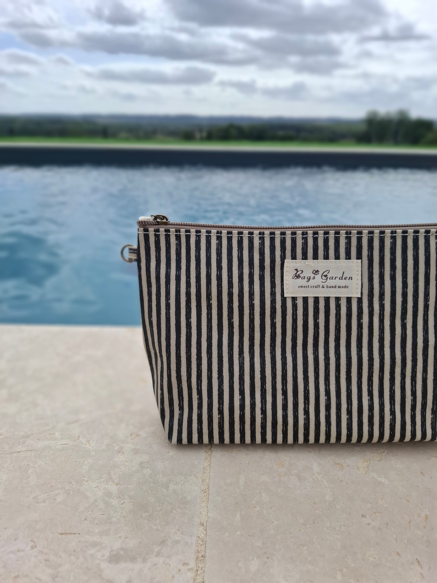 Pochette trousse en tissu imperméabilisé noir et blanc