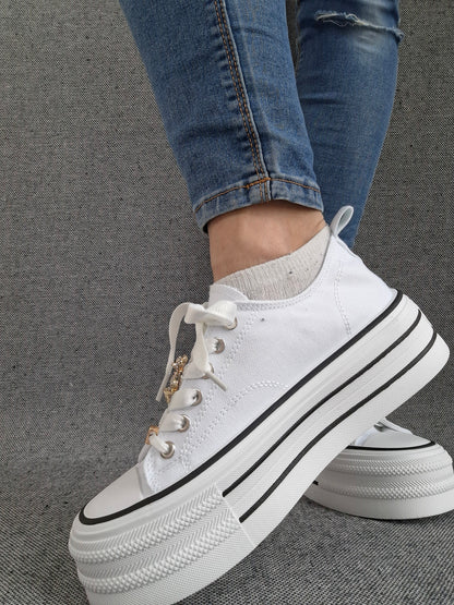 Chaussures baskets basses semelle compensée en tissu blanc style converse