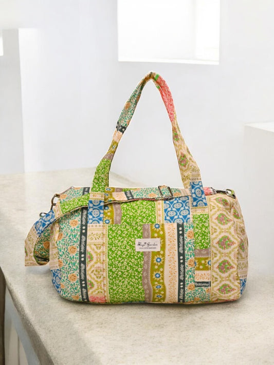 Sac polochon en tissu motifs patchwork multicolore imprimés floraux et géométriques