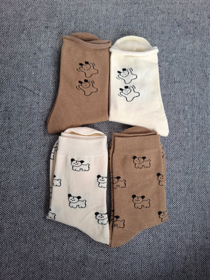 Paire de chaussettes blanches en coton à motifs deux petits chiens noirs