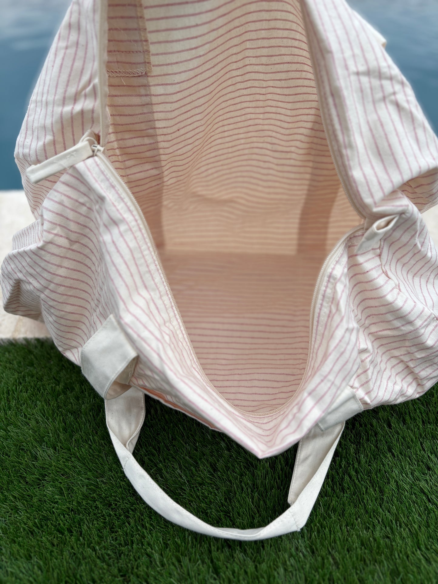 Sac polochon week end de voyage en coton léger rayé beige rouge rose