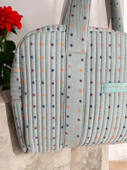 Sac week end de voyage polochon coton matelassé vert d'eau étoiles multicolores