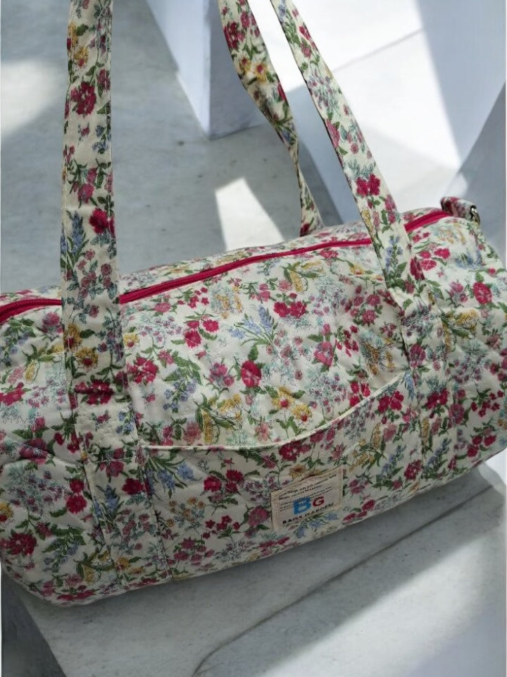 Nouveautés - Sac polochon en coton matelassé motifs à fleurs fuschia