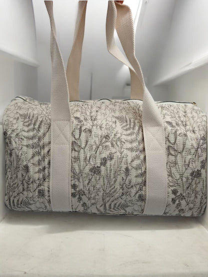 Sac polochon blanc en coton liberty fleuri noir