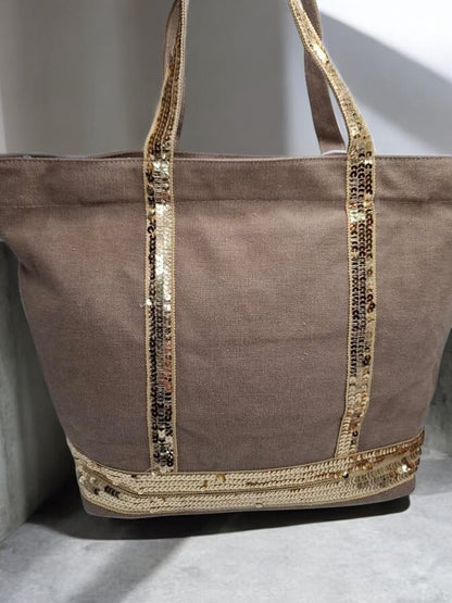 Sac à main style cabas porté main en tissu taupe avec sequins dorés