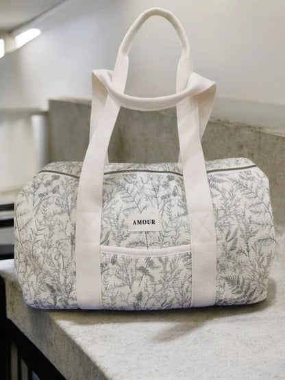 Nouveautés - Sac polochon blanc en coton liberty fleuri noir