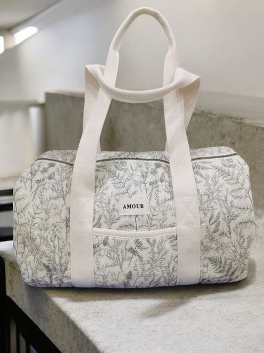 Nouveautés - Sac polochon blanc en coton liberty fleuri noir