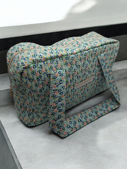 Sac week-end polochon en coton matelassé liberty fleuri bleu turquoise et touches orange