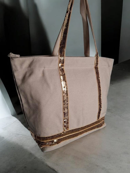 Sac à main style cabas porté main en tissu beige avec sequins dorés