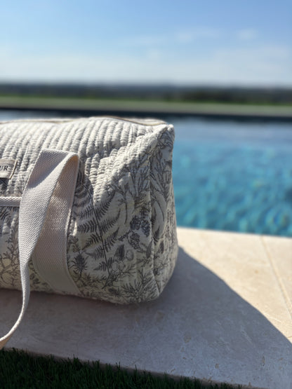 Sac polochon blanc en coton liberty fleuri noir