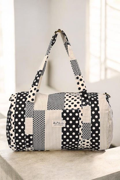 Sac polochon week end de voyage en tissu coton patchwork motifs à pois noir et blanc
