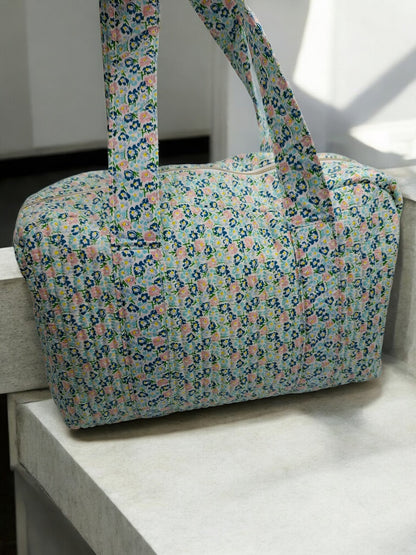 Sac week-end polochon en coton matelassé liberty fleuri bleu turquoise et touches orange