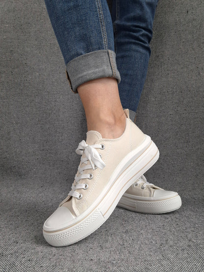 Chaussures baskets en toile beige clair semelle compensée style converse