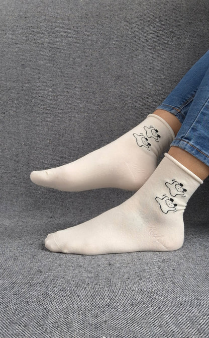 Paire de chaussettes blanches en coton à motifs deux petits chiens noirs