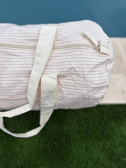 Sac polochon week end de voyage en coton léger rayé beige rouge rose