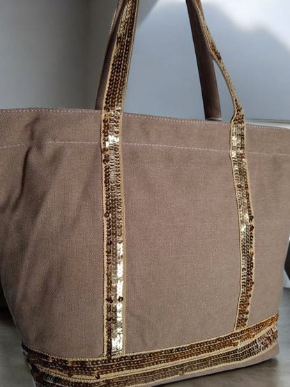 Sac à main style cabas porté main en tissu taupe avec sequins dorés