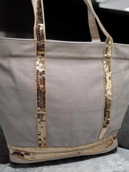 Sac à main style cabas porté main en tissu beige avec sequins dorés