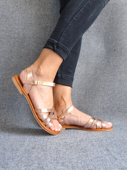 Chaussures sandales plates à brides entrecroisées doré rosé