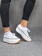 Zapatillas bajas de plataforma de lona blancas