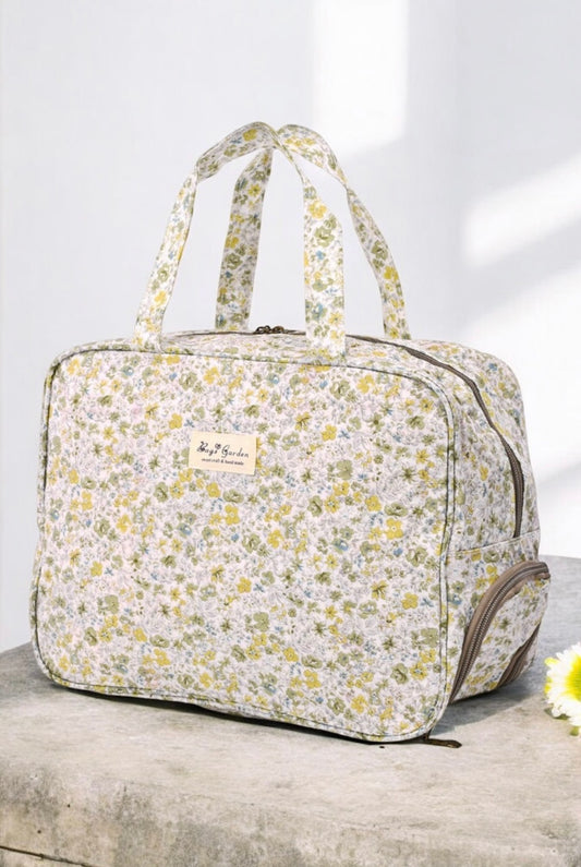Sac polochon week-end beige motif liberty floral multicolore avec des motifs jaune vert et bleu