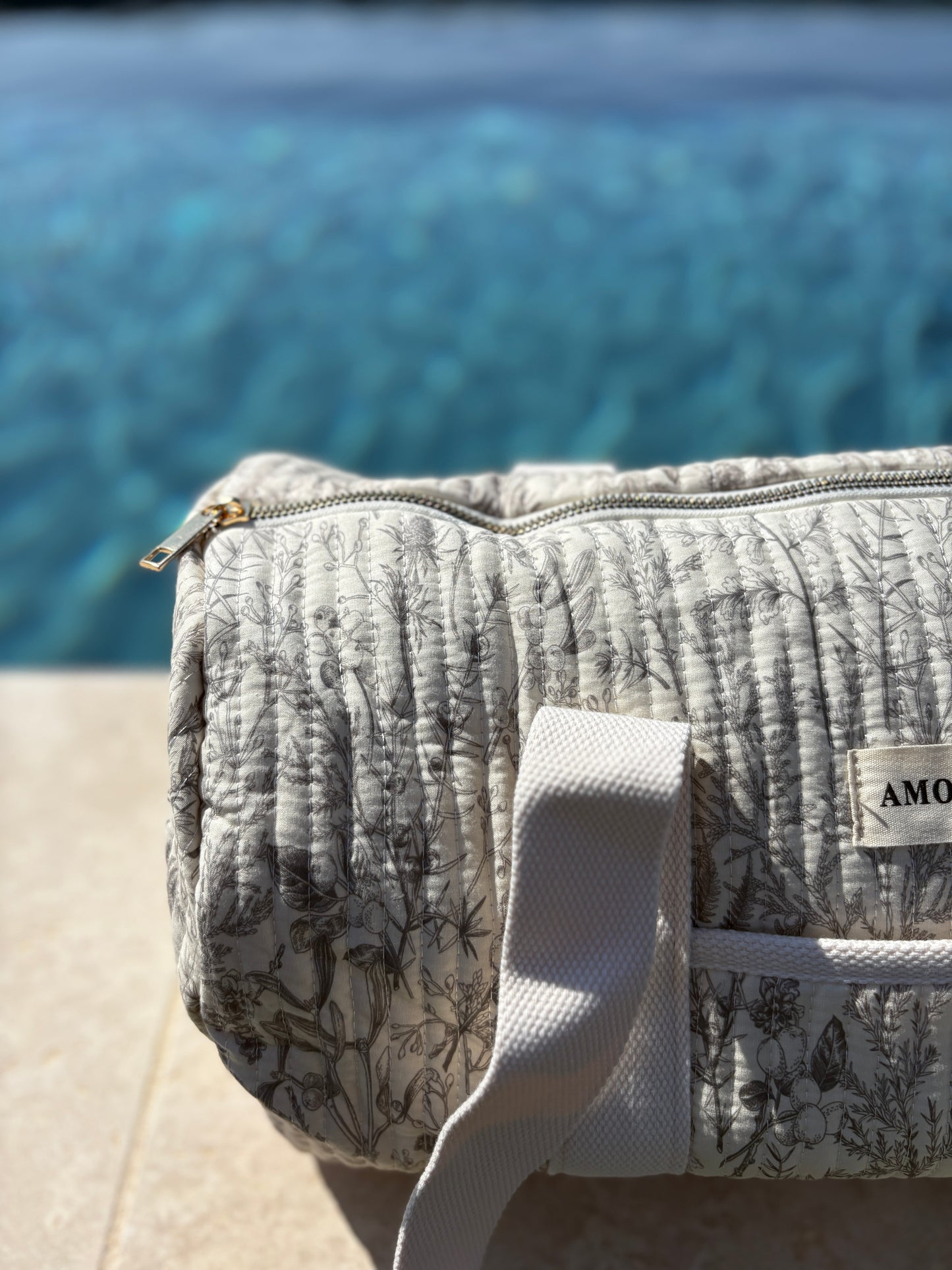 Sac polochon blanc en coton liberty fleuri noir