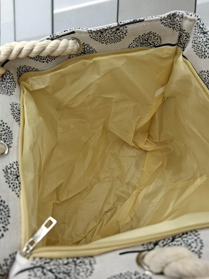 Sac à main de plage porté à l’épaule blanc motifs arbres