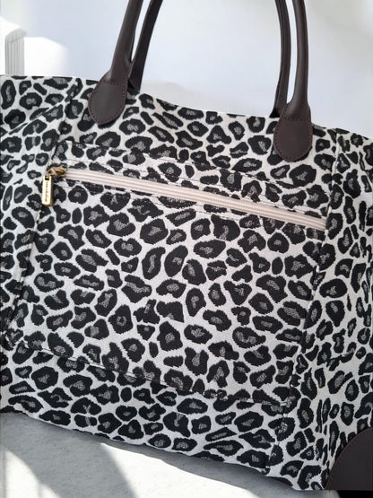 Grand sac porté épaule imprimé léopard blanc noir